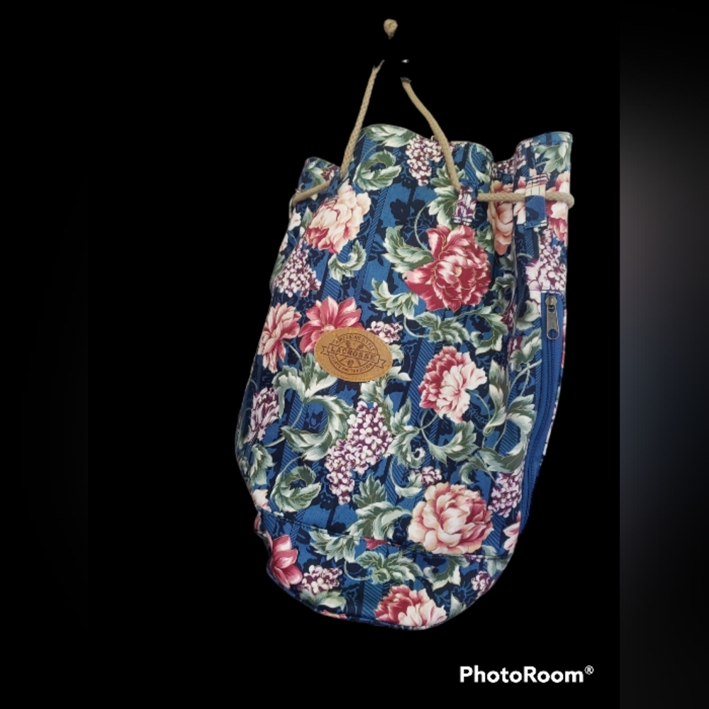 LACROSSE FLORAL VINTAGE SLING BAG.